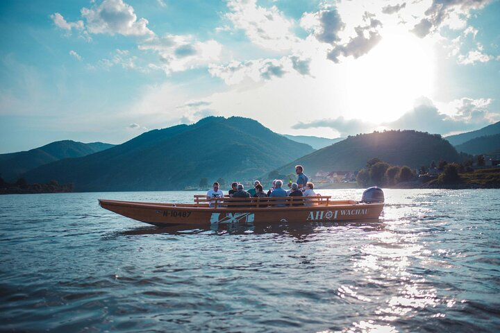 Wine tasting on traditional wooden boats in Wachau Valley - Photo 1 of 6