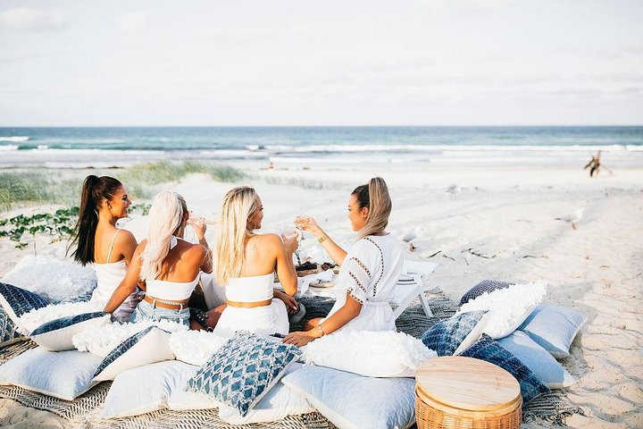 Hens night, ladies lunch, birthday or celebration in a stunning beach, creek or mountain location. The girls celebrating here with a beach sunset.