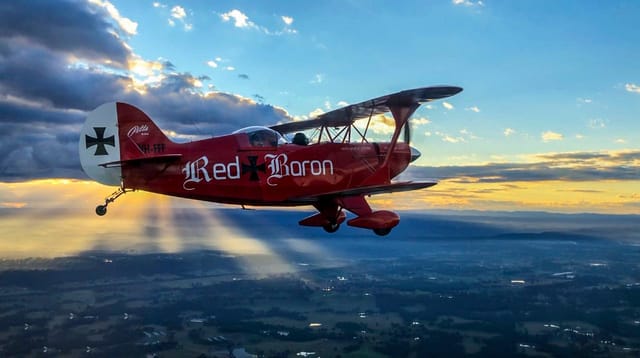 Intense 60 minute Aerobatics Experience in the Red Baron Biplane - Photo 1 of 4