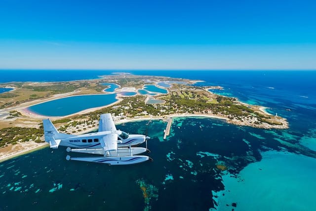 Seaplane flying past Rottnest Island
