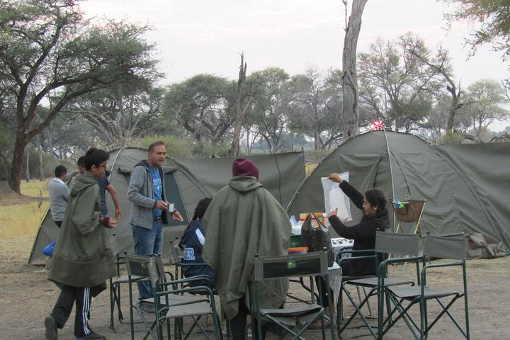 Clients being shown the map on how the tour will cover which areas of the Okavango delta