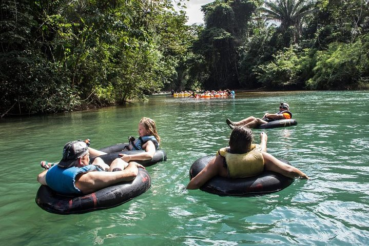 Floating towards the cave entrance of Cave tubing