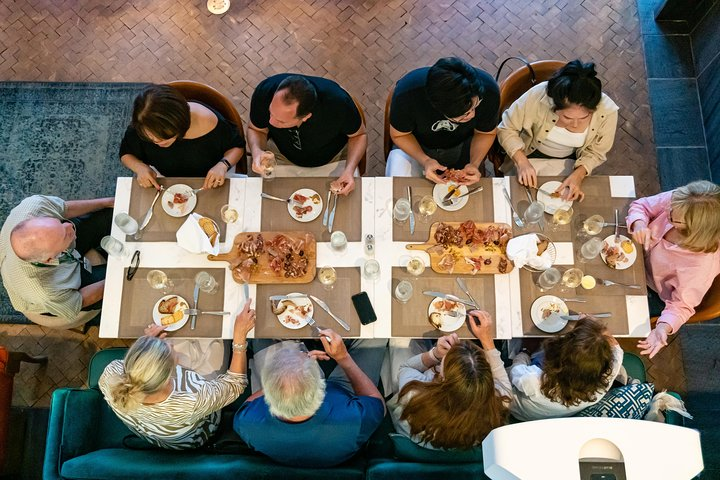 Sharing a charcuterie platter at Bar Artefact in Auberge Saint Antoine