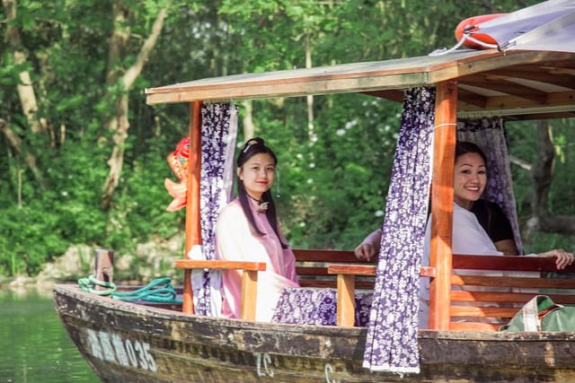 1-day Chinese Cosplay, Tea Ceremony & Shaded Stream Boating at the Xixi Wetlands - Photo 1 of 6