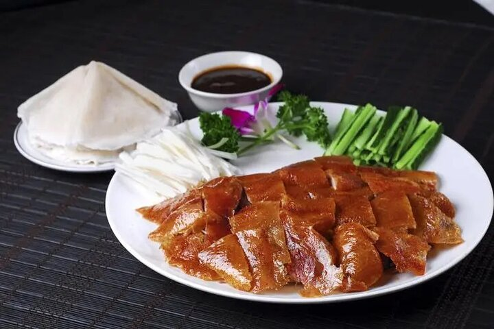 Beijing Roast Duck Dining with Acrobatic Show - Photo 1 of 7