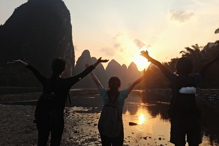 My clients enjoying Xingping sunset