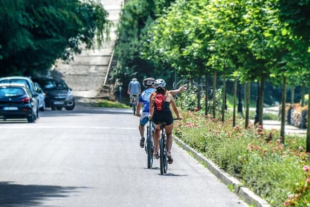 Cycling on Hangzhou's manicured streets - botanical beauty is part of the city's charm.