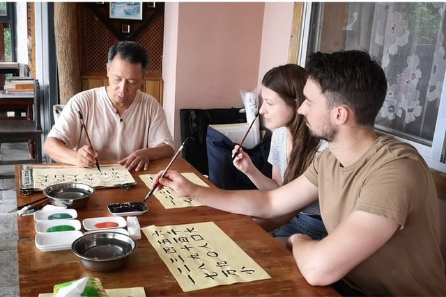 One Hour Chinese Calligraphy or Painting Lessons in Your Yangshuo Hotel - Photo 1 of 6