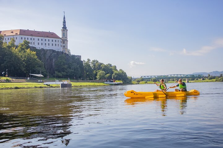 Enjoy the view of the Děčín chateau from the water