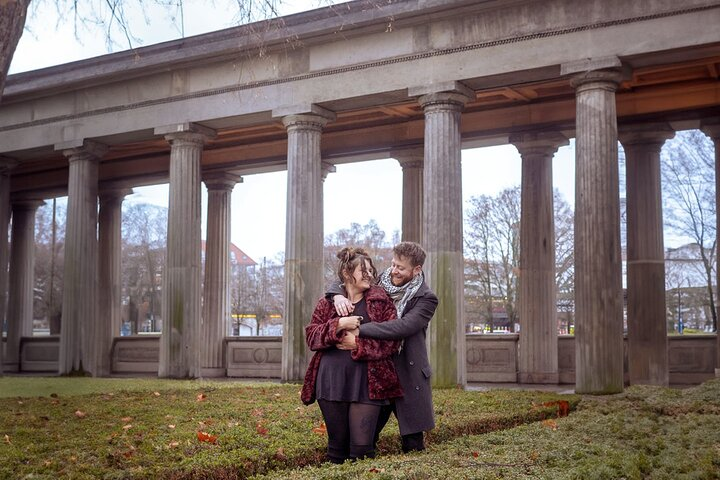 Experience the charm of Berlin's Museum Island where stunning architecture and lush gardens create the perfect setting for unforgettable couple photos that celebrate your unique love story.