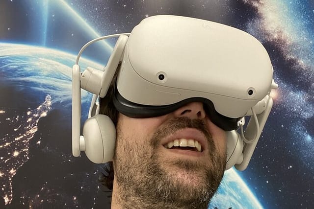 A person immersed watchig the Apollo 11 VR Experience