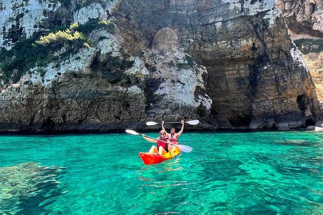 Kayak Paradise: Cala Portixol Snorkel, Cave & Cliff Jumping Tour - Photo 1 of 15