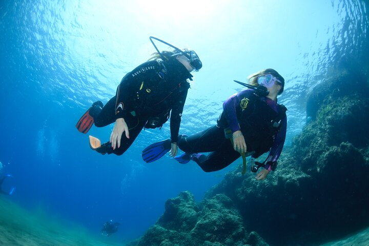 Nicole diving in Playa Chica bay