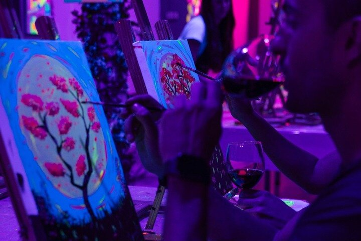 Paint a neon fluorescent picture while drinking unlimited wine - Photo 1 of 14