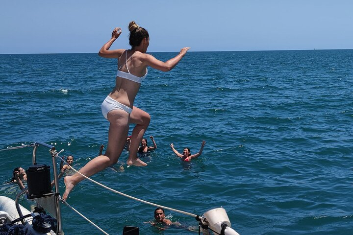 Cruise with Paella on Board & Cocktail at the Beach