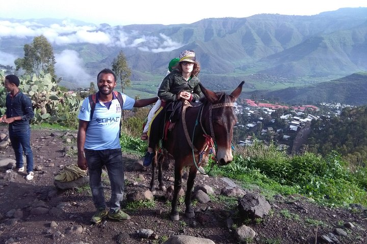 Our customers with their 6 and 7 years old children doing the Northern Ethiopia Community based Tourism around Lalibela, Ethiopia. 