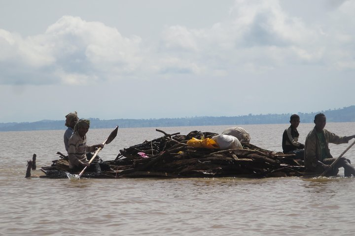 Papers boat caring Fire wood Lake Tana