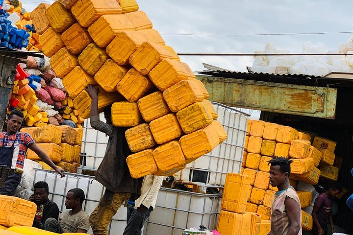 Recycling of old plastic and metal inside the biggest open-air market in Africa - Merkato