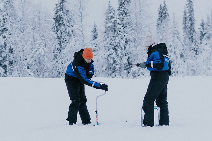 Snowmobile Ice Fishing in Levi - Photo 1 of 7