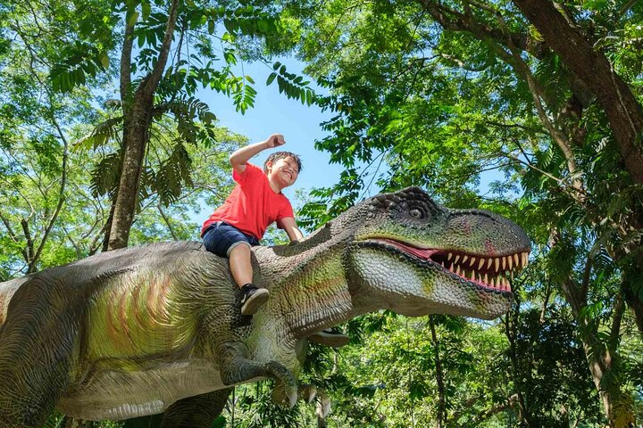 Enjoying one of our Dinosaurs at the Dino Park.