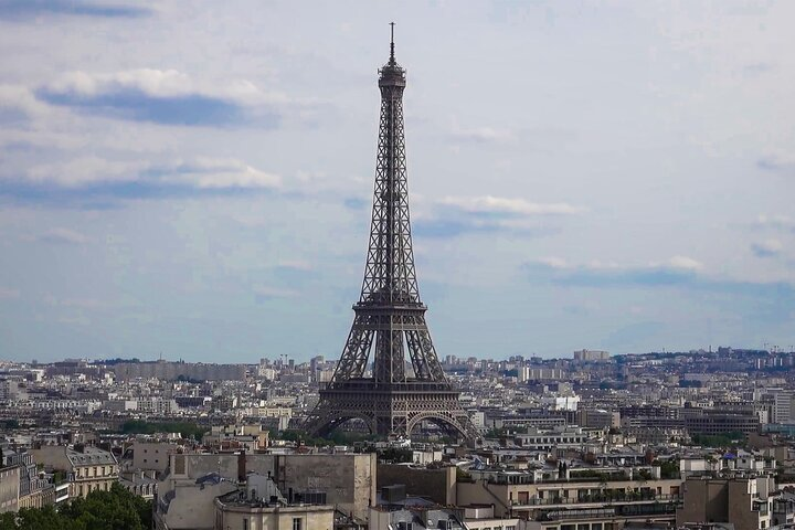 Experience breathtaking panoramas of Paris from the Eiffel Tower. Explore iconic landmarks with a knowledgeable guide and enjoy optional add-ons like a Seine River cruise or lunch at the tower.