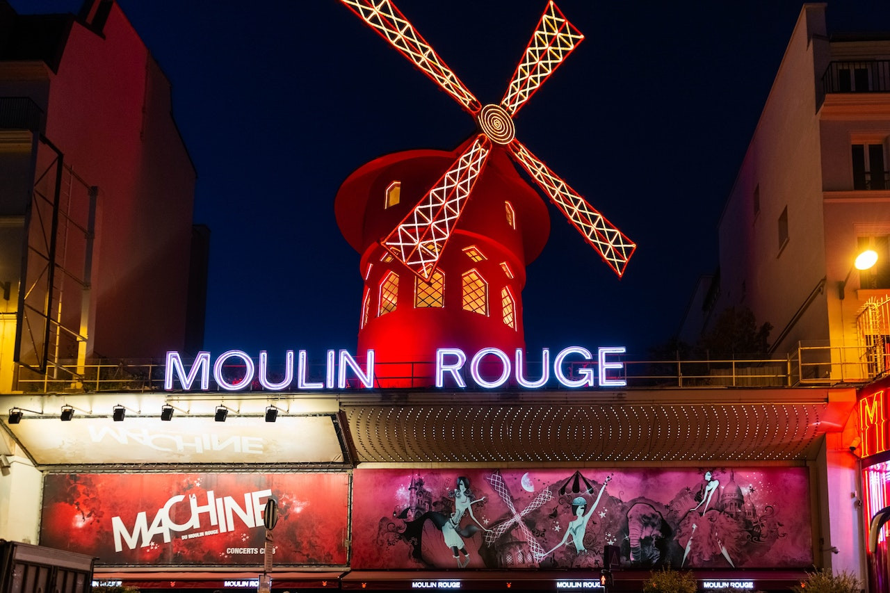 Moulin Rouge Cabaret Show with Drop-off Service and Seine River Cruise - Photo 1 of 8