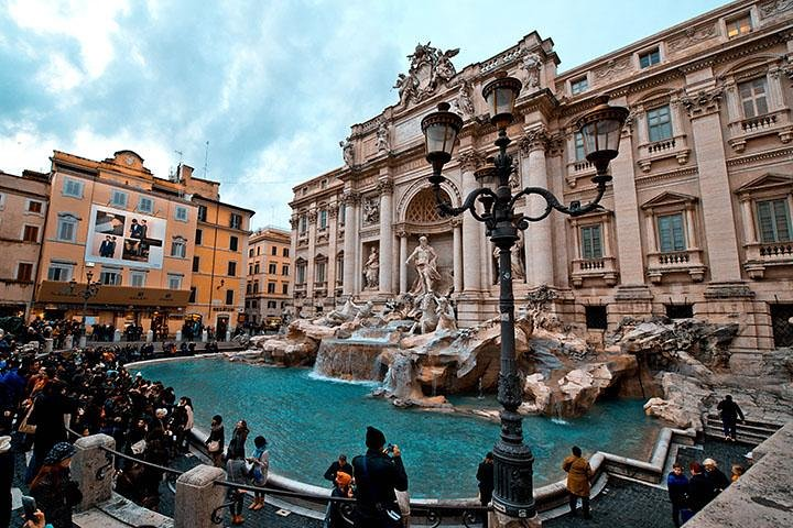 Visit Rome and toss a coin in the Trevi Fountain