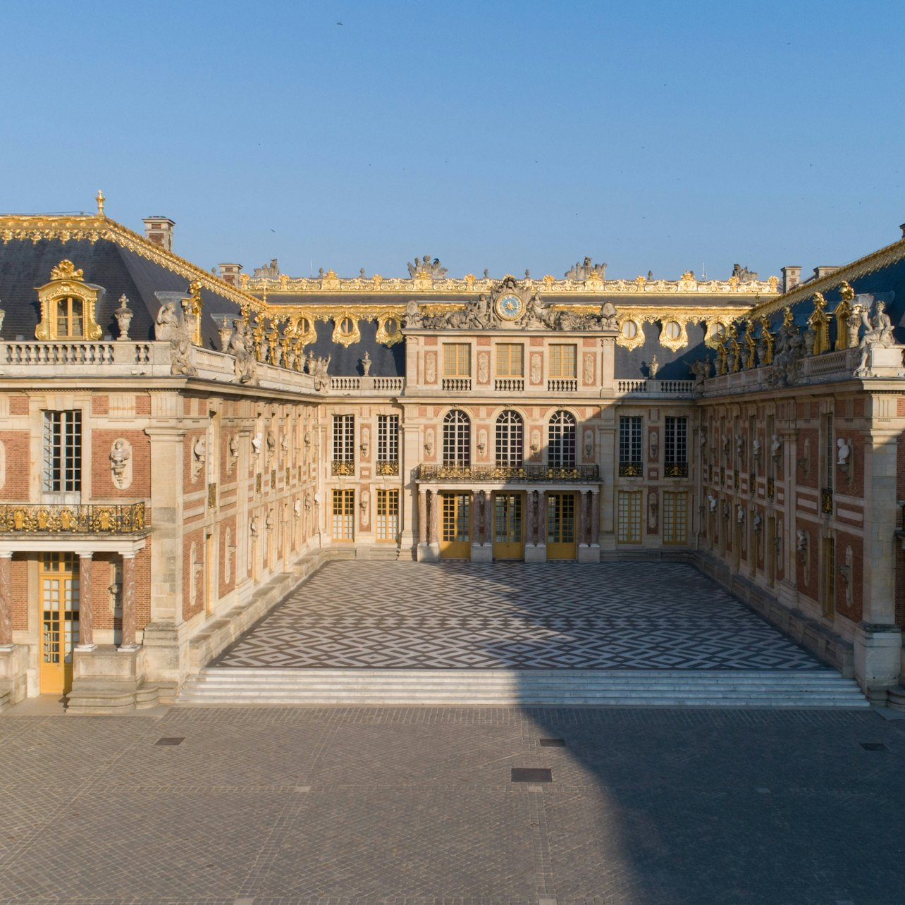 Discover the grandeur of Versailles Palace with its stunning architecture expansive gardens and historical charm all while enjoying a smooth journey through Paris's iconic landmarks.