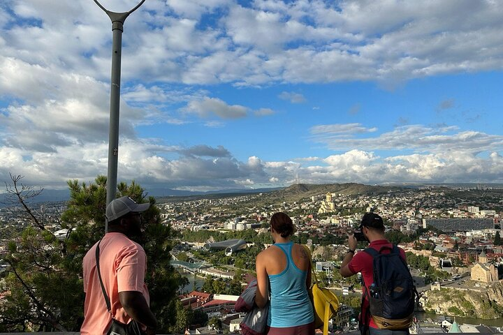 The guests are enjoying stunning views from Narikala mountain