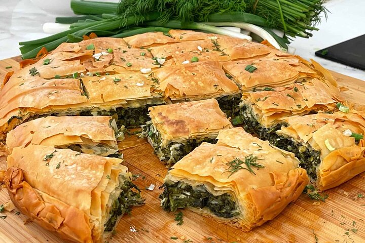 Spinach Pie: Learn the opening and spreading technique of a dough sheet and fill it with cheese or spinach.