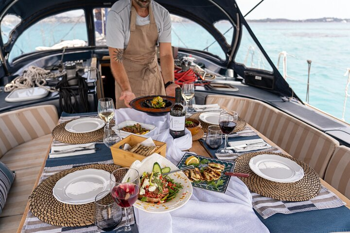 Setting the table while you are enjoying the sea.