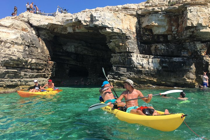 Cliffs and entrance into the small cave