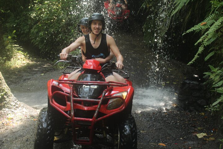 ATV Quad Bike Through Tunnel and Waterfall - Photo 1 of 24