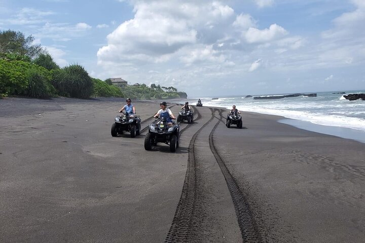 Bali ATV Ride Tour In the beach black sand atv tour - Photo 1 of 25