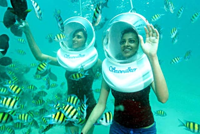 Try out sea walking experience with your friends underwater