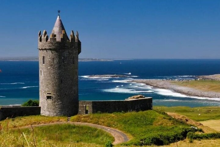 View of Doolin from the Cliffs of Moher. You can see the Aran islands just behind the Tower.