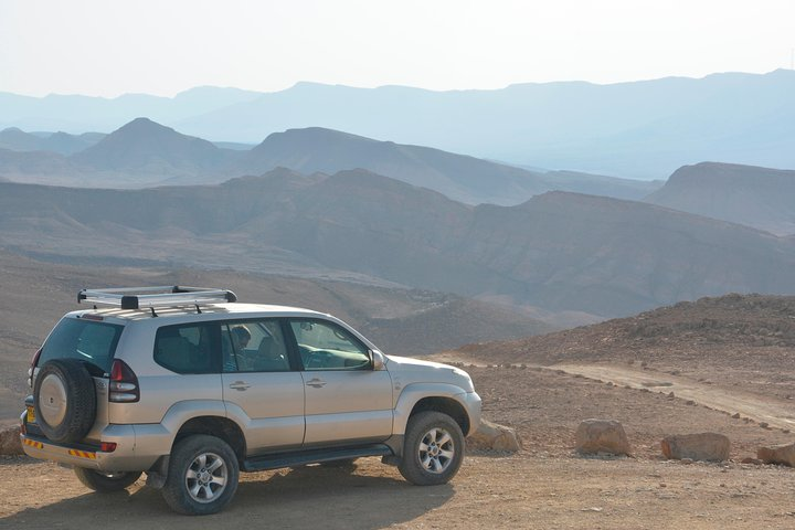 Down a rocky slope - Ramon crater