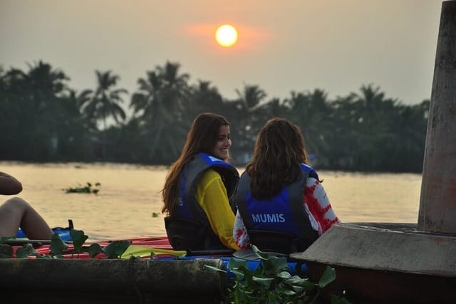 Some Spanish ladies enjoying the backwaters on a kayak in Alleppey