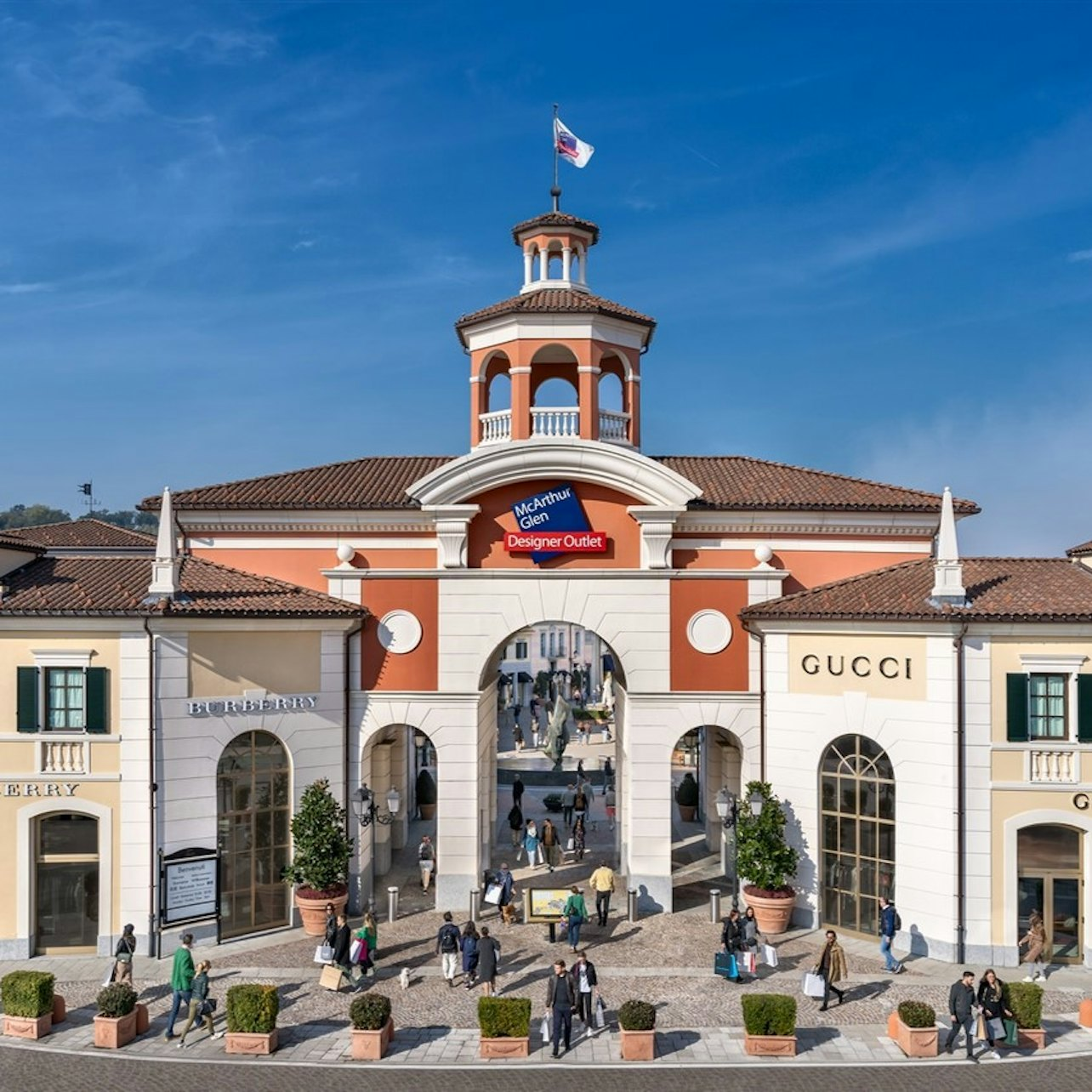 Discover a shopper's paradise at Serravalle Designer Outlet where luxury brands meet scenic views delicious dining and an enjoyable experience amid the picturesque Piedmont vineyards.