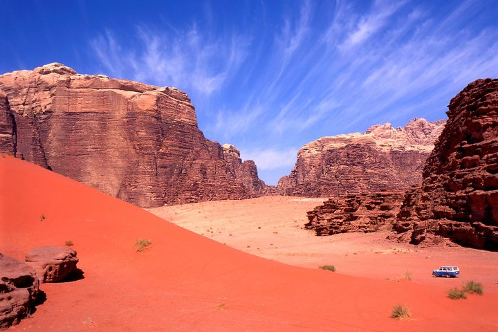 Panoramic view of red sand dunes