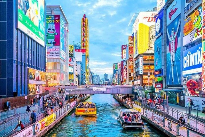 The Dotonbori river with its massive neon billboards