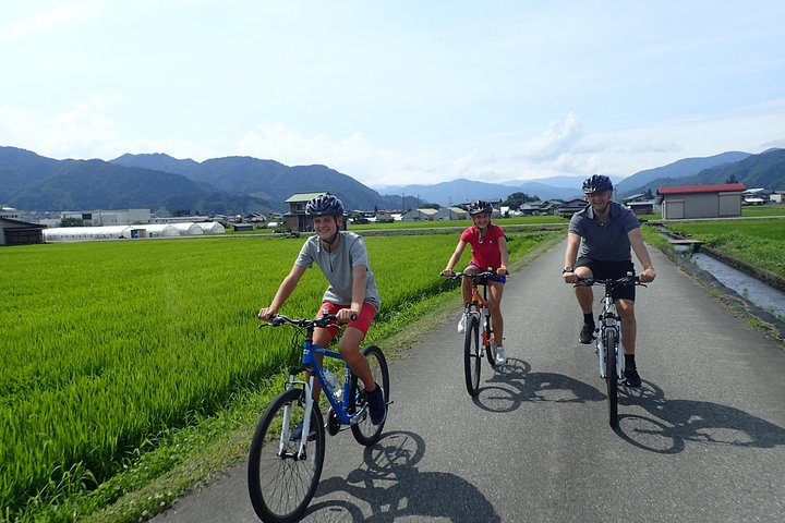 Cycling in the middle of rice field