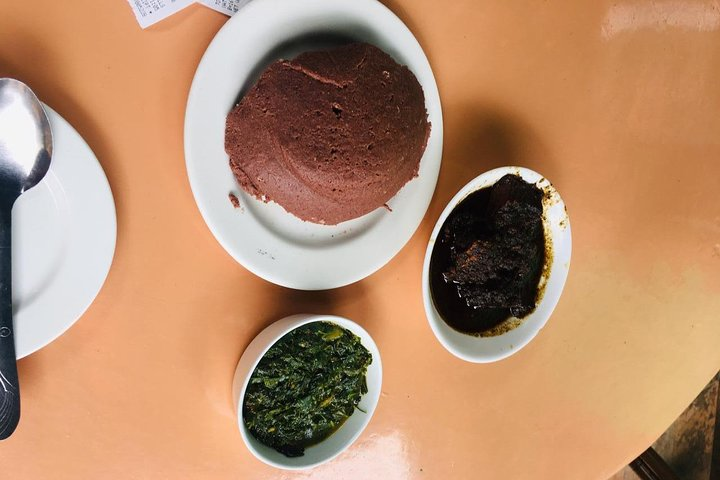 Brown ugali and local vegetables.