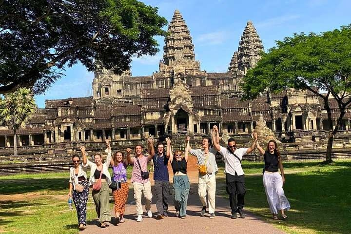 A fun and small group photo at the mother temple of Angkor Wat on Explore Angkor Wat Temple Tour