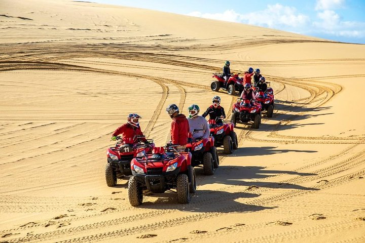 Quad bike throw the dunes