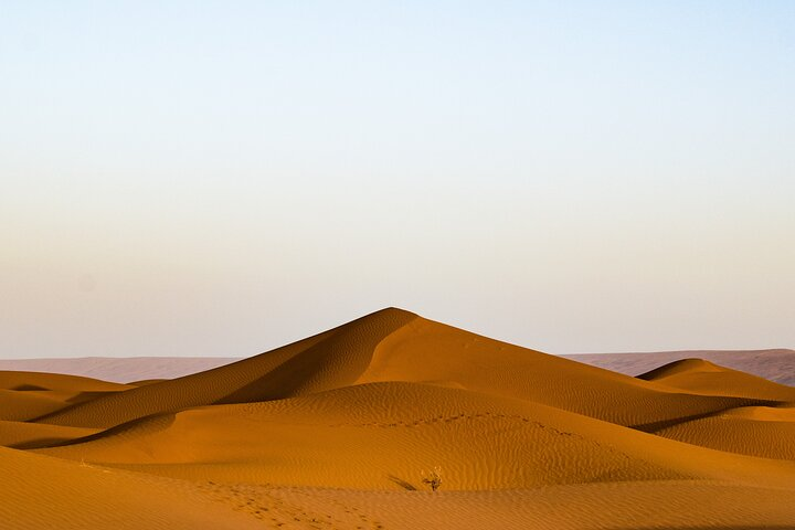 Camel trekking and camping in the sand dunes of the Moroccan Sahara