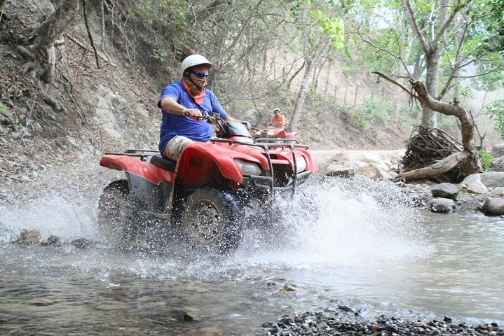 atv through jungle