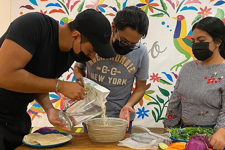 Elaboration of tortillas by hand following the Mexican tradition  - Photo 1 of 12