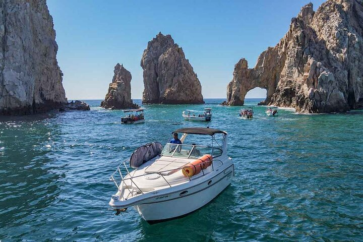 The Watering Hole Yacht in the Arch of Los Cabos