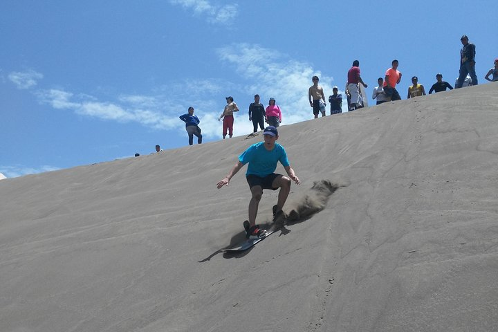 Sliding through the sand dunes